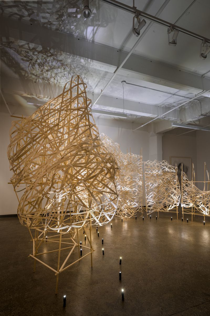 A woven flat reed installation titled Glacier by Stephen Talasnik at Court Tree Collective in Brooklyn, NY.