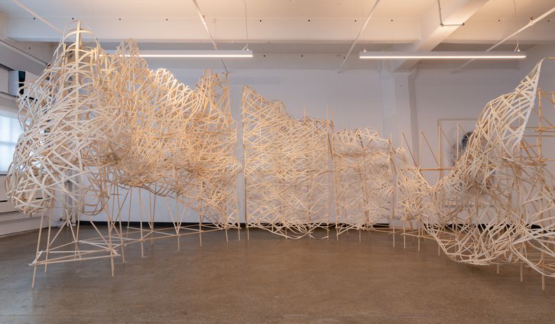 A woven flat reed installation titled Glacier by Stephen Talasnik at Court Tree Collective in Brooklyn, NY. Photograph by Christian Nguyen Studio.