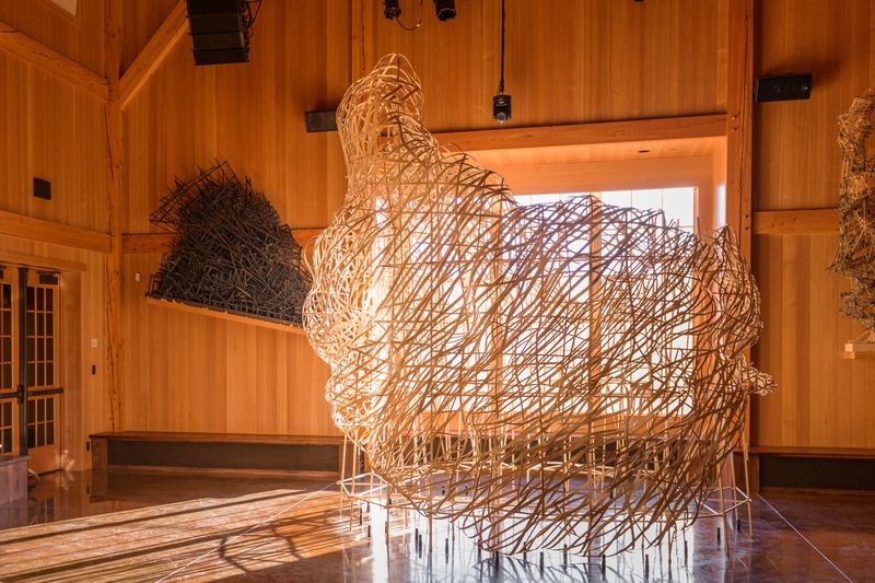 A woven flat reed installation titled Hive: Tippet Rise by Stephen Talasnik at Tippet Rise Art Center in Montana.
