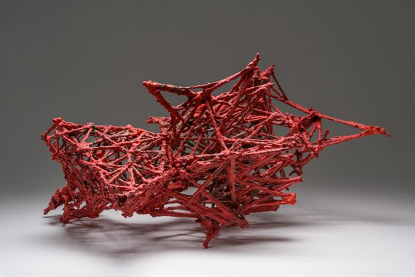 A quarry stone, pigment, acrylic resin, and wood sculpture titled Debris Field #222: Crushed by Stephen Talasnik.
