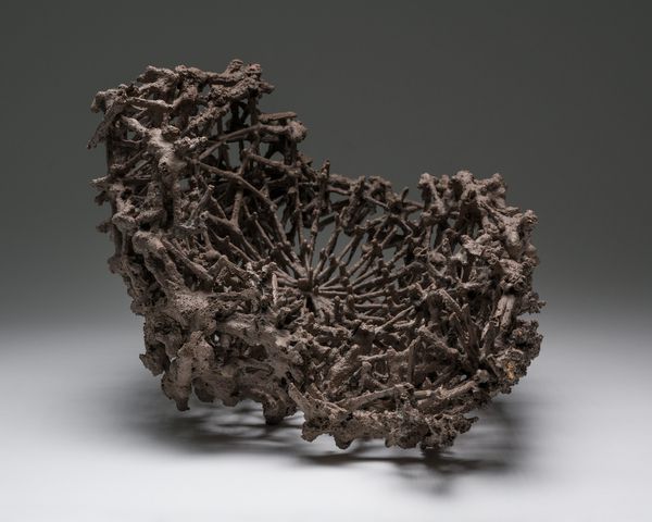 A quarry stone, pigment, acrylic resin, and wood sculpture titled Debris Field #54: Dome by Stephen Talasnik.